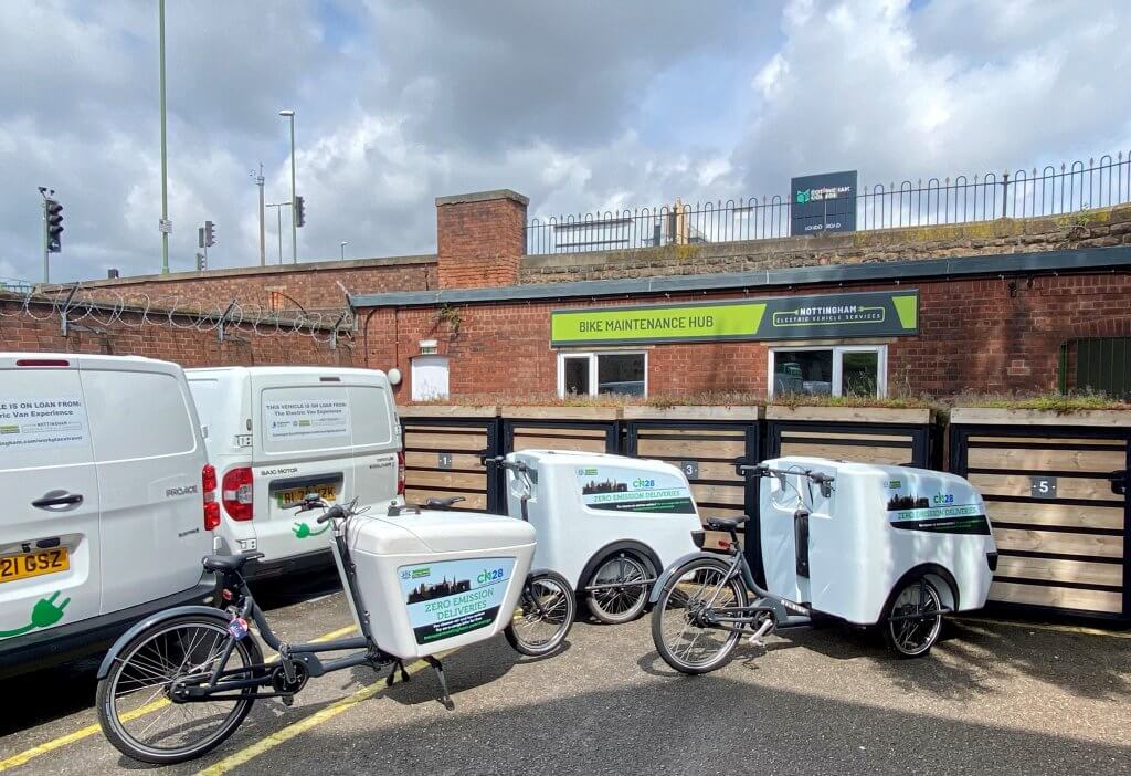 Three e-cargo bikes parked outside the Bike Maintenance Hub at Eastcroft depot