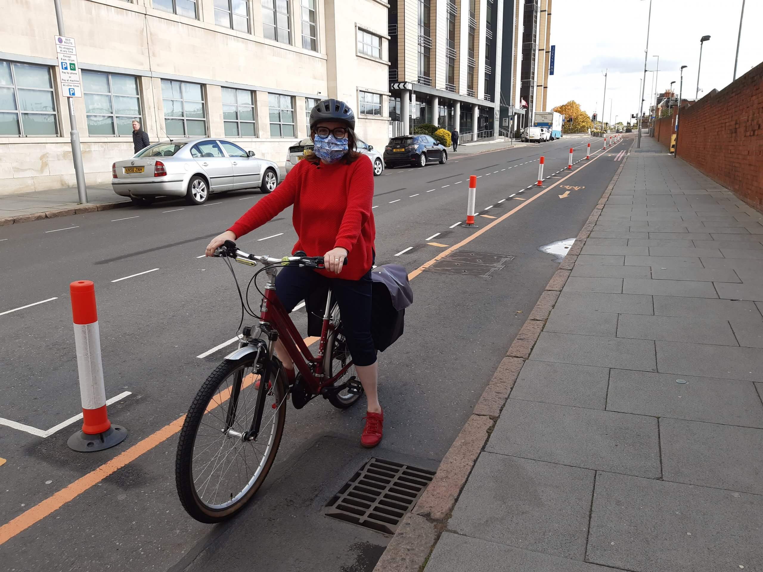 Cllr Williams using the trial cycle lane on Station Street