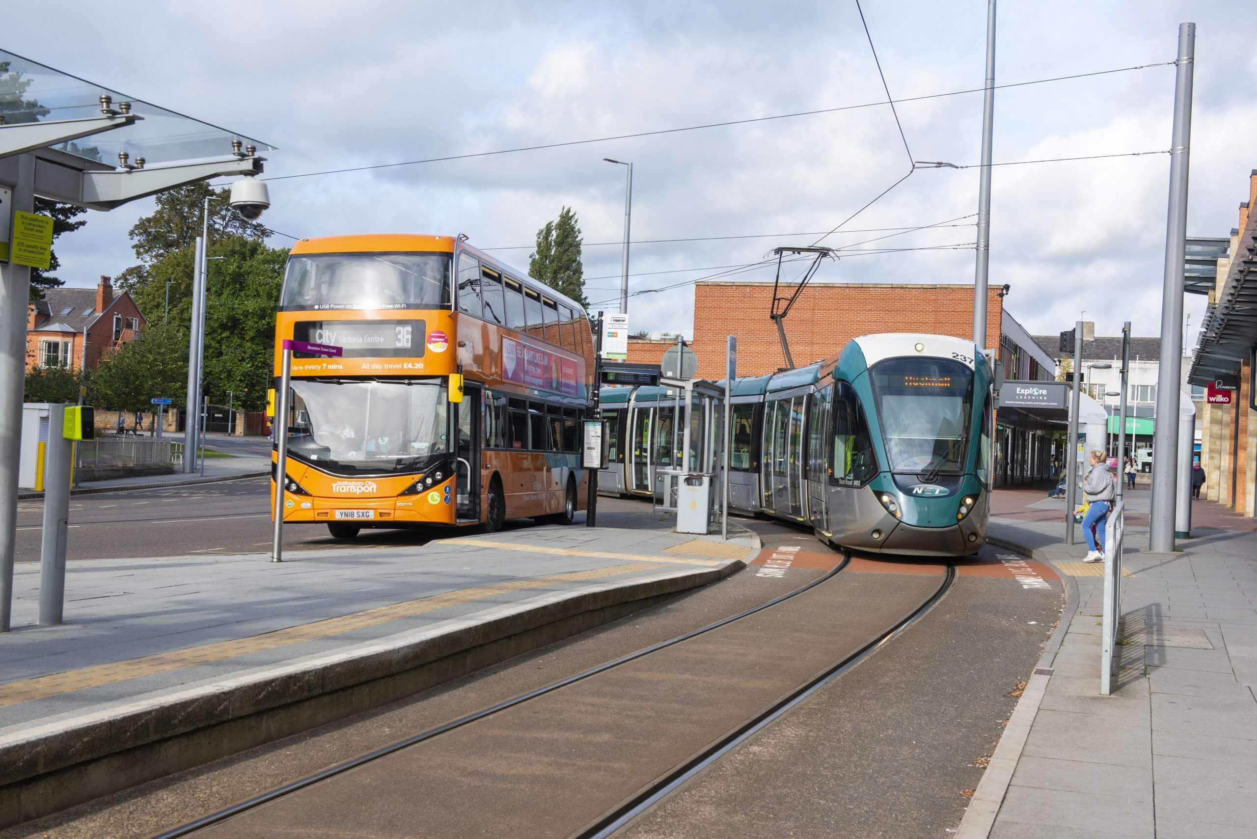 A bus and tram at Beeston Interchange