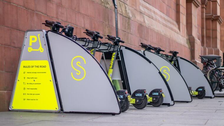 E-scooters parked in new parking racks outside Nottingham Station