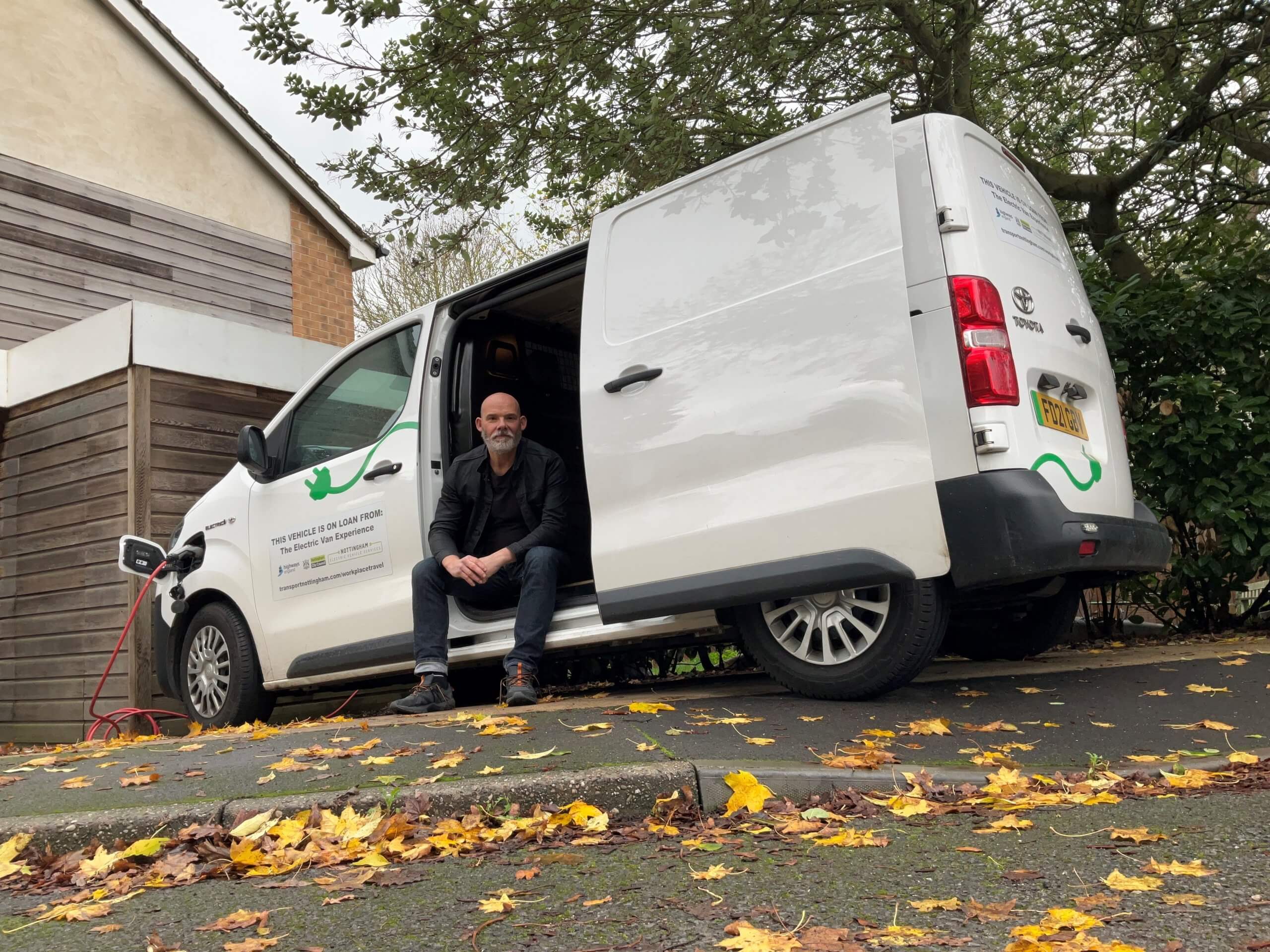 100th EVE customer Mark Bushnell sat in his loaned electric van