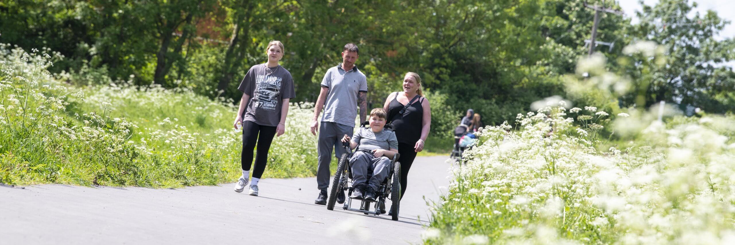 Family walking in Colwick Park